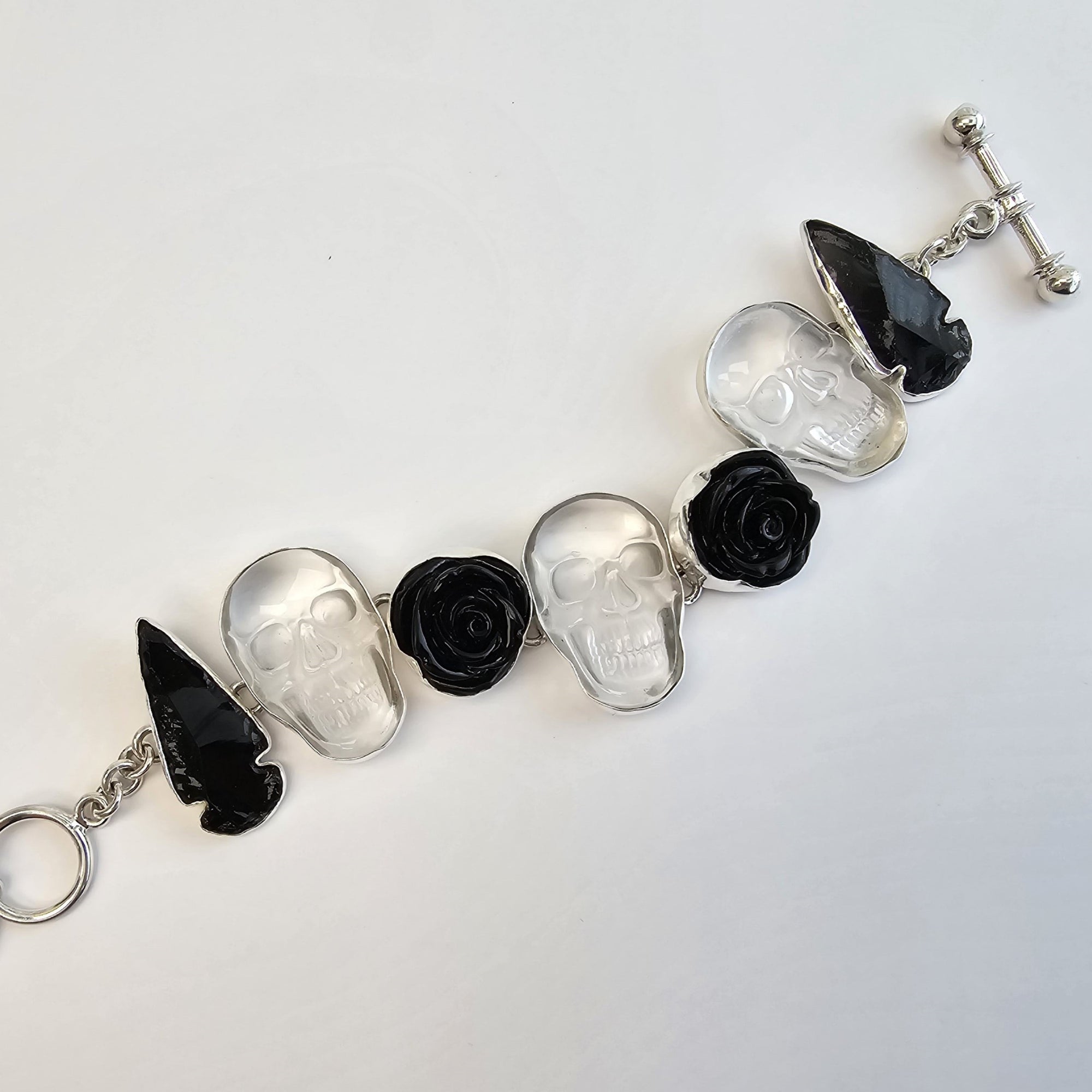 Sterling Silver Obsidian Arrowhead and Clear Quartz Skull Bracelet | Charles Albert Jewelry