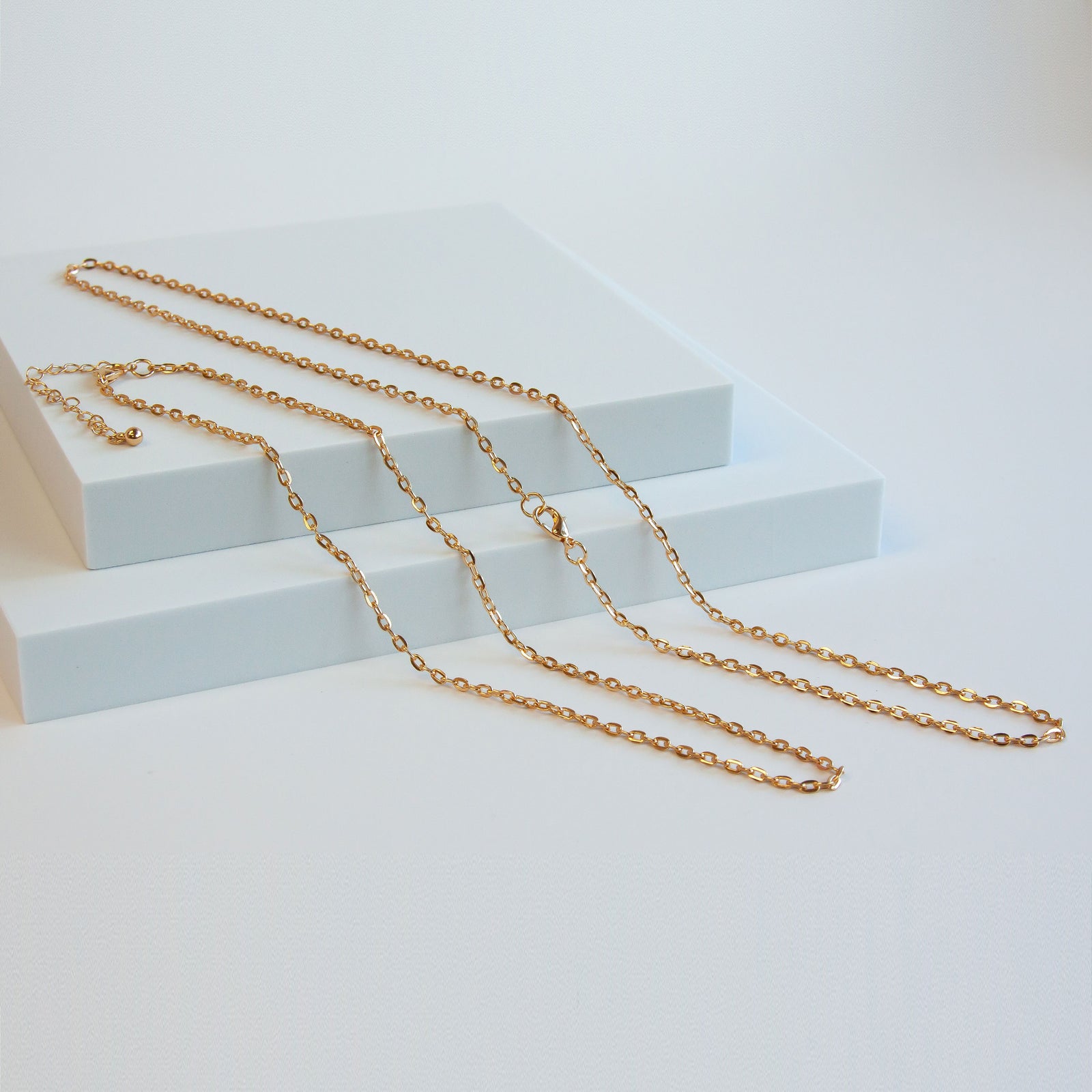 New 3mm Gold Tone Base Metal Flat Oval Chain | Charles Albert Jewelry