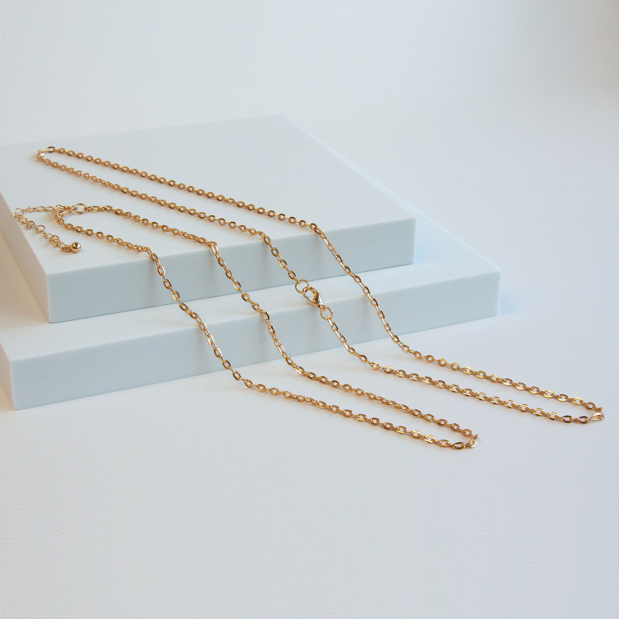 New 3mm Gold Tone Base Metal Flat Oval Chain | Charles Albert Jewelry