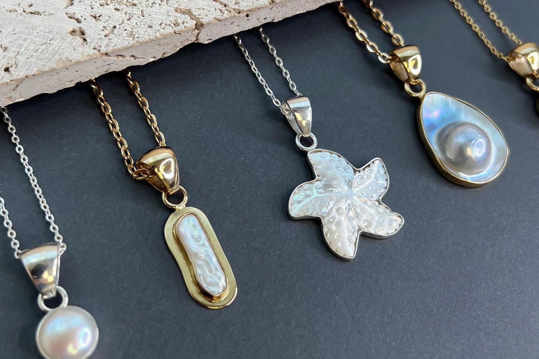 Different types of pearl pendants by Charles Albert Jewelry