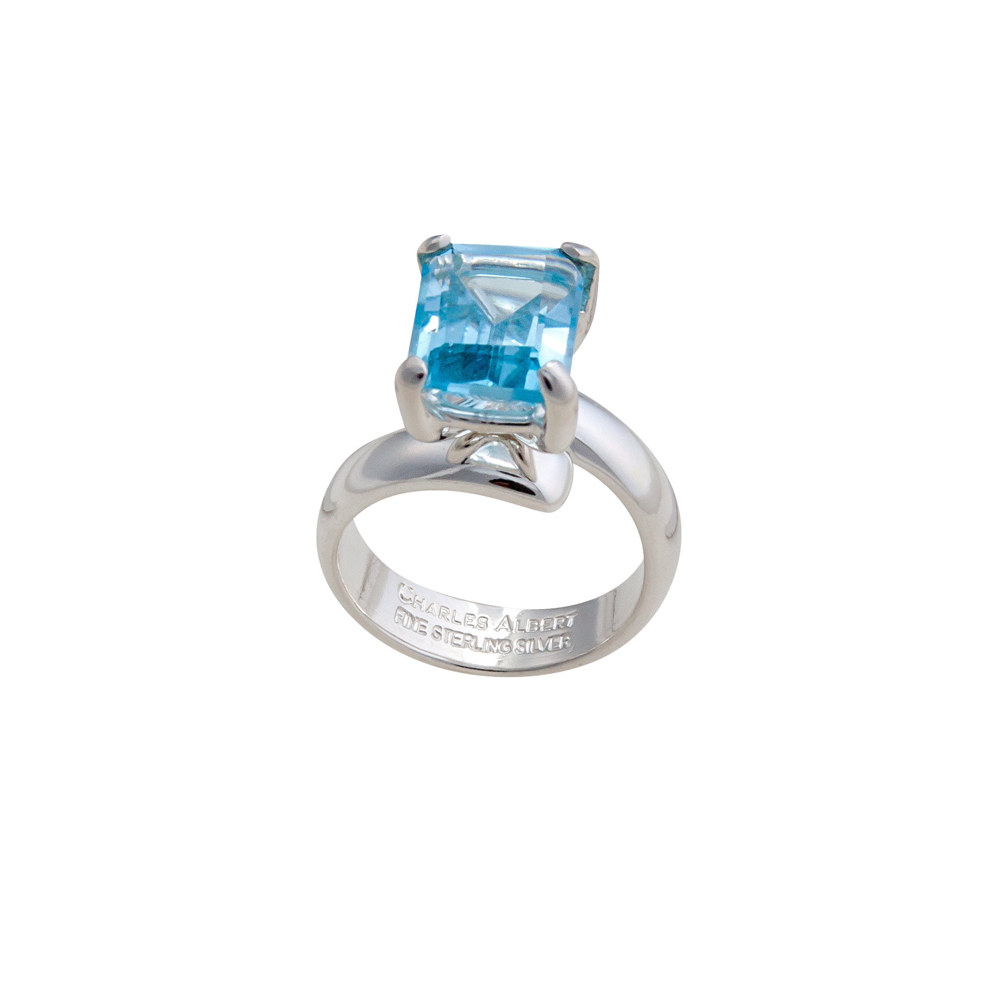 Sterling Silver Blue Topaz Petite Prong Set Adjustable Ring | Charles Albert Jewelry