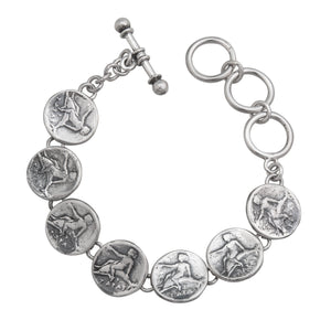 Sterling Silver Replica Boy on Dolphin Coin Bracelet | Charles Albert Jewelry